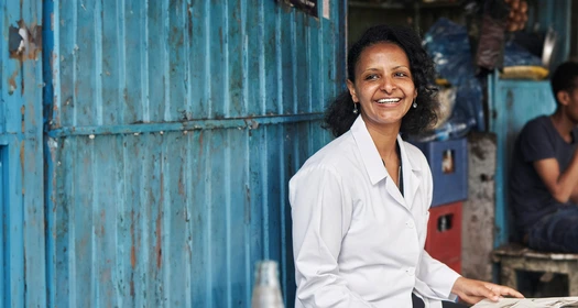 A female doctor looking in the distance