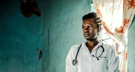 A female doctor looking in the distance