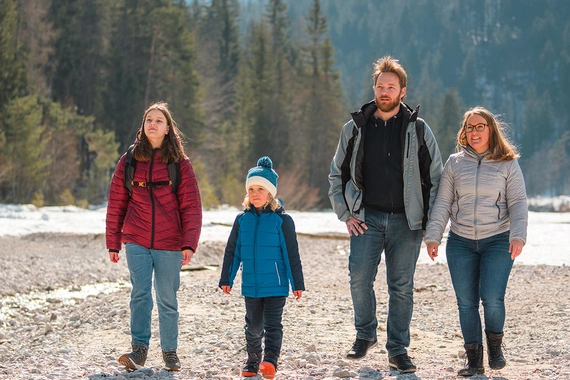Family hiking in mountains
