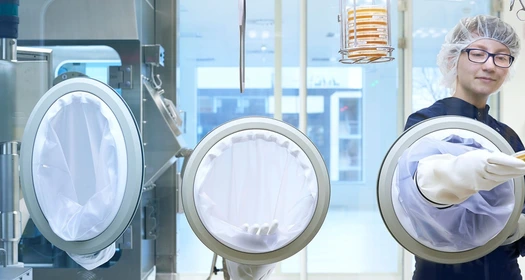 production-specialist-holding-material 