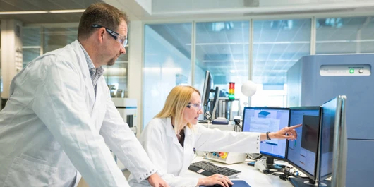 Scientists Viewing Monitors